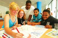 Teachers with pupils in a classroom